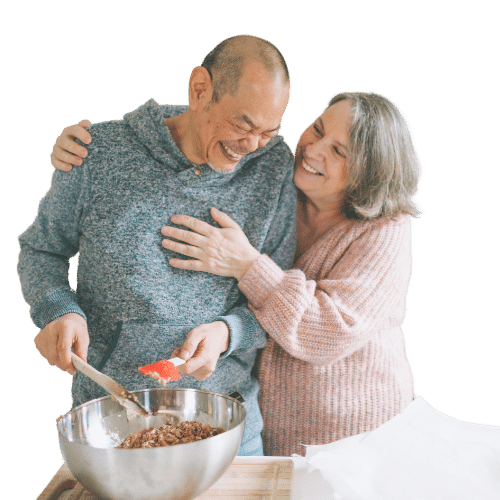 older couple mixing food
